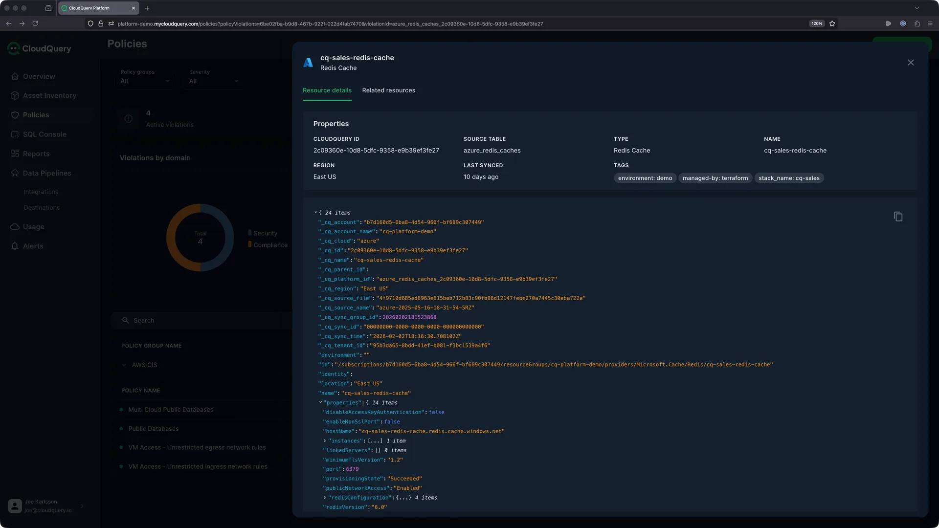Violating resource detail view showing properties, metadata, and JSON configuration for a Redis Cache with public access enabled