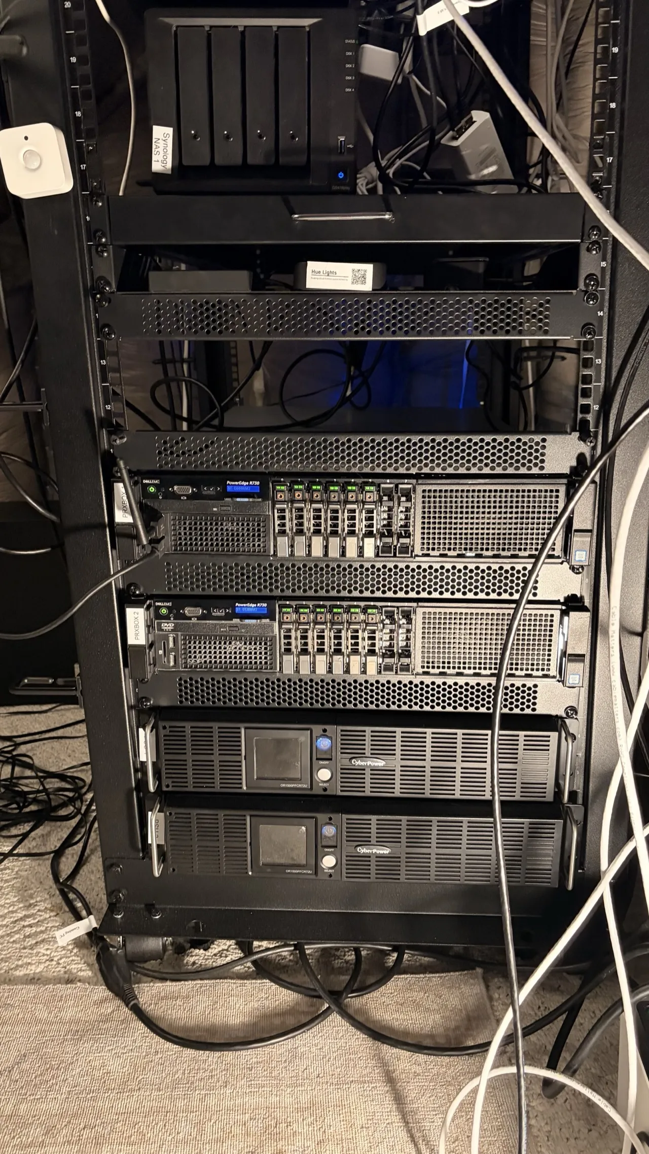Front view of both Dell R730 servers in the rack with drive bays and status LEDs visible