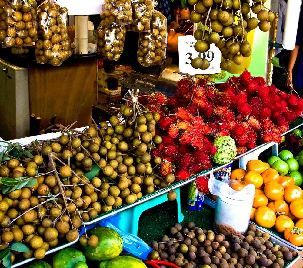 Exotic tropical fruits at Honolulu Chinatown market stall