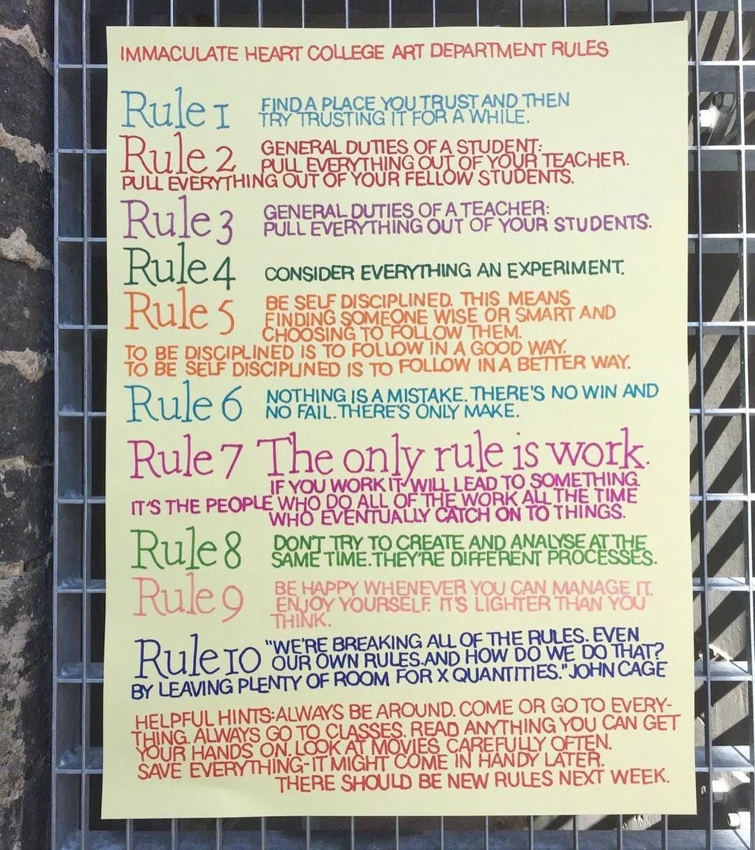 Immaculate Heart College Art Department Rules poster showing all ten rules in colorful handwritten text, with Rule 7 reading 'The only rule is work'